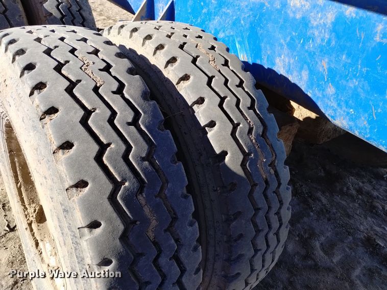 image for item DV6612 APM 28TP side dump trailer