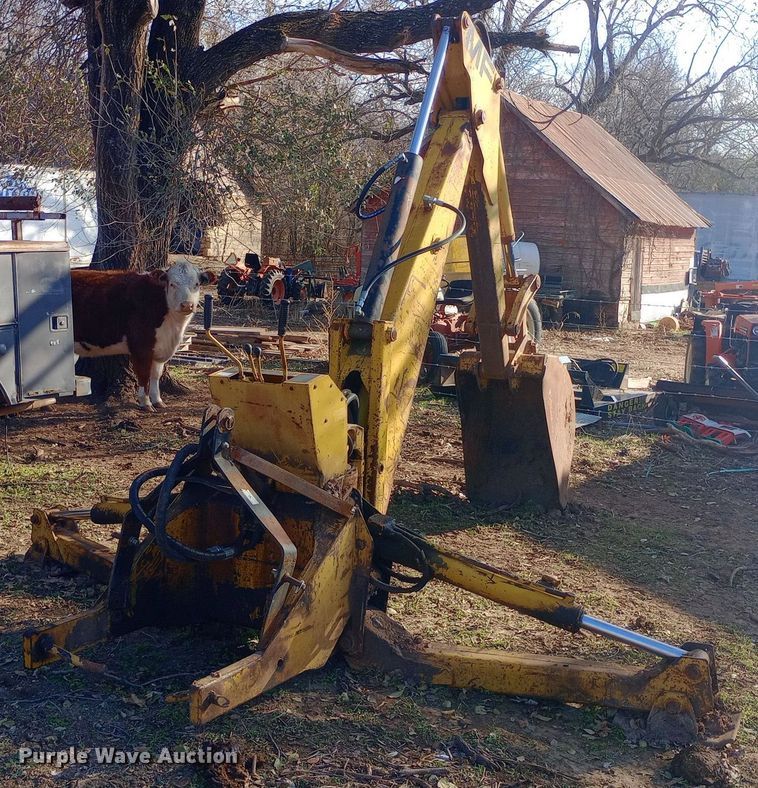 image for item DW0990 Massey Ferguson  backhoe attachment