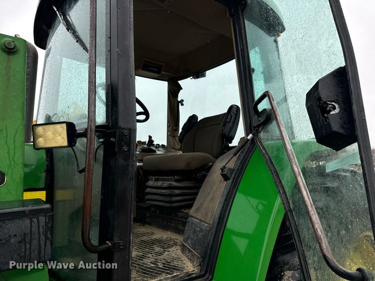 image for item EG6994 1997 John Deere 7410 MFWD tractor