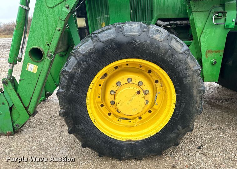 image for item EG6994 1997 John Deere 7410 MFWD tractor