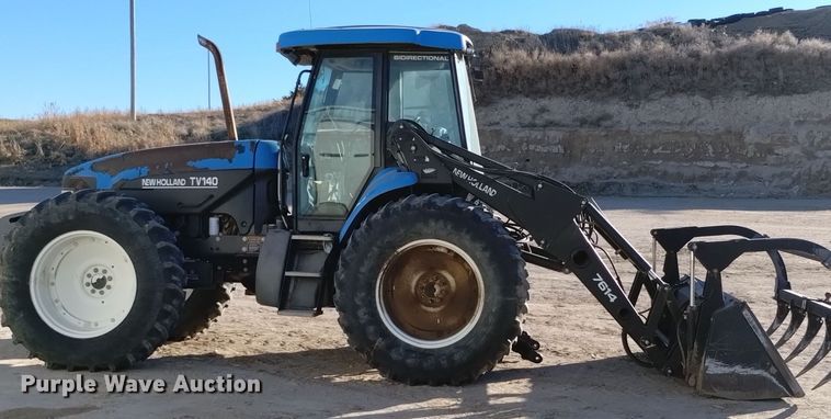 image for item EG9969 2002 New Holland TV140 bi-directional tractor