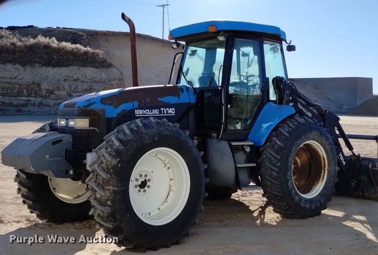 image for item EG9969 2002 New Holland TV140 bi-directional tractor