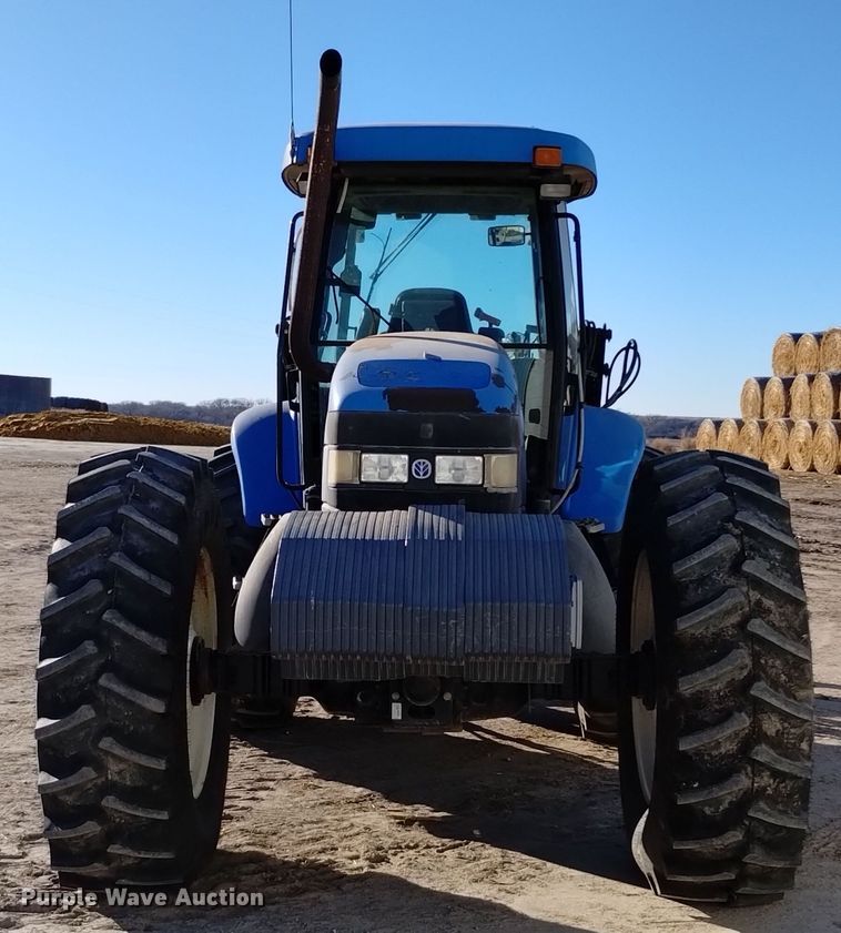 image for item EG9969 2002 New Holland TV140 bi-directional tractor