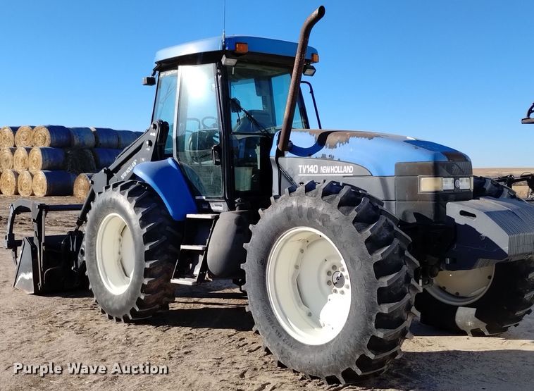 image for item EG9969 2002 New Holland TV140 bi-directional tractor
