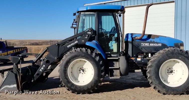 image for item EG9969 2002 New Holland TV140 bi-directional tractor