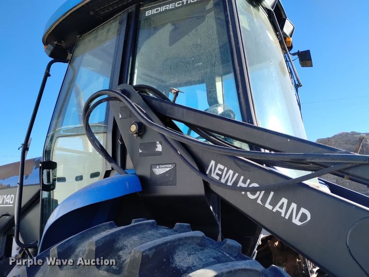 image for item EG9969 2002 New Holland TV140 bi-directional tractor