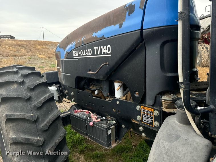 image for item EG9969 2002 New Holland TV140 bi-directional tractor