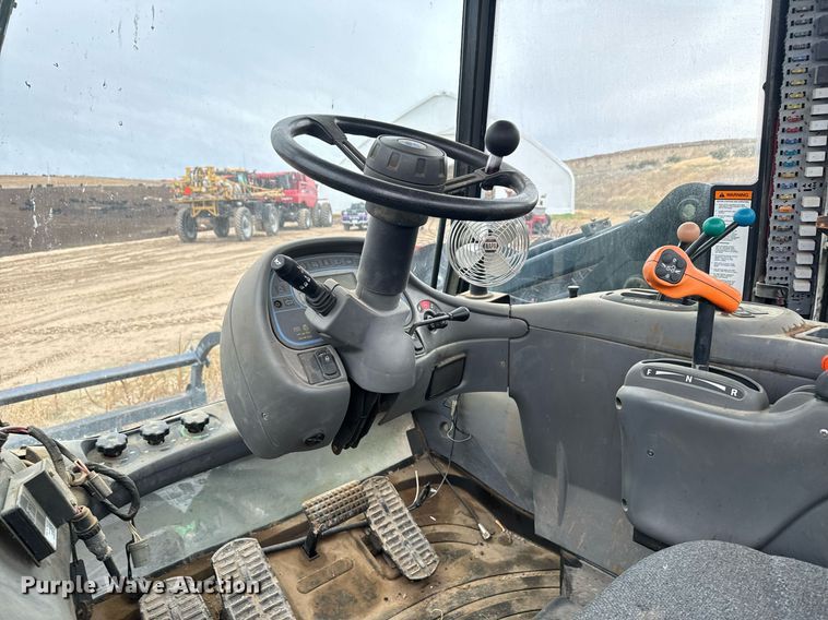 image for item EG9969 2002 New Holland TV140 bi-directional tractor