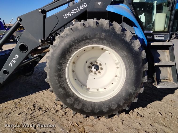 image for item EG9969 2002 New Holland TV140 bi-directional tractor