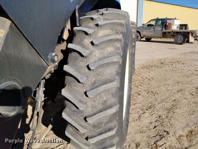 image for item EG9969 2002 New Holland TV140 bi-directional tractor