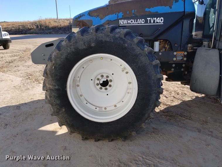 image for item EG9969 2002 New Holland TV140 bi-directional tractor