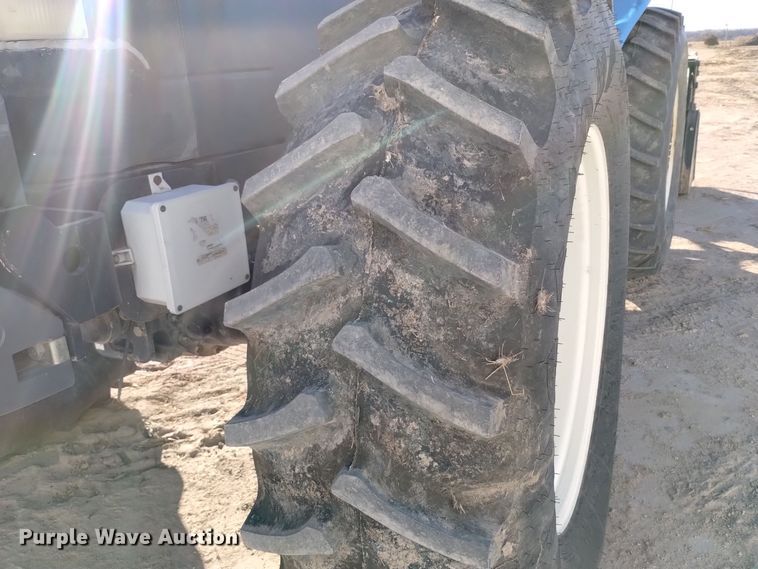 image for item EG9969 2002 New Holland TV140 bi-directional tractor