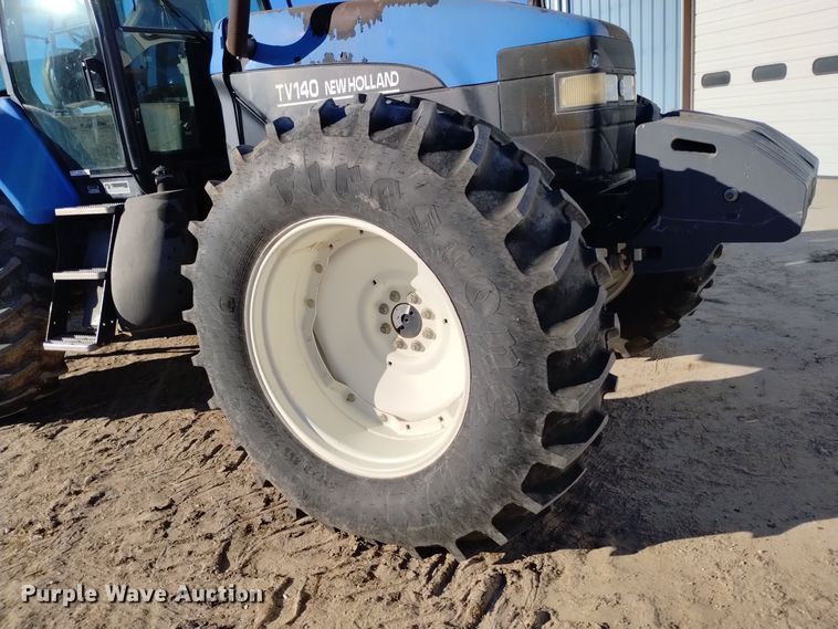 image for item EG9969 2002 New Holland TV140 bi-directional tractor