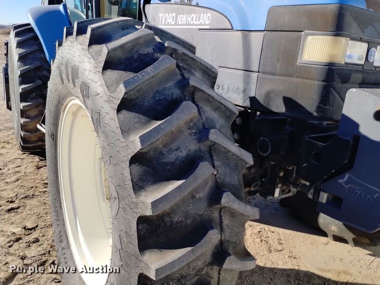 image for item EG9969 2002 New Holland TV140 bi-directional tractor