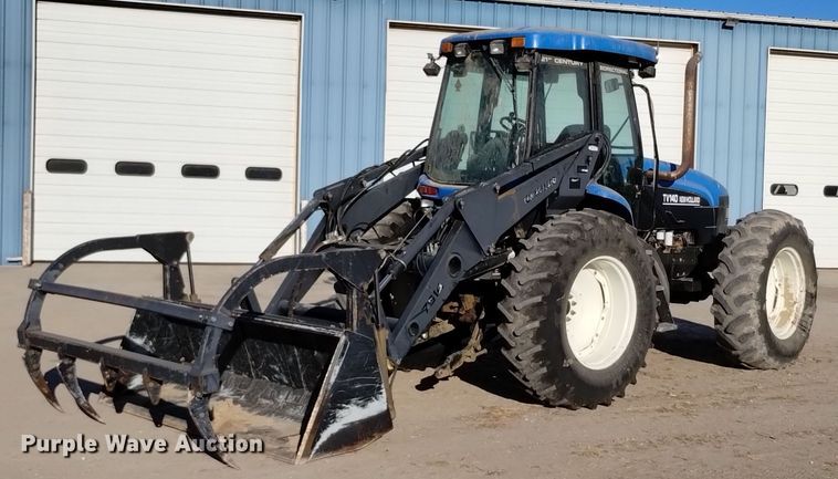 image for item EG9980 2002 New Holland  TV140 bi-directional tractor