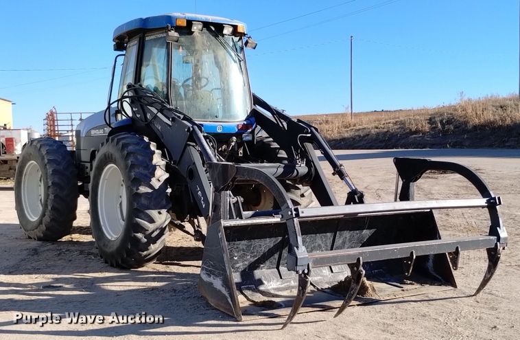 image for item EG9980 2002 New Holland  TV140 bi-directional tractor