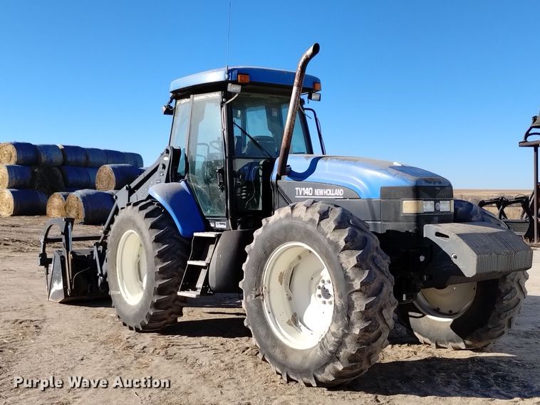 image for item EG9980 2002 New Holland  TV140 bi-directional tractor