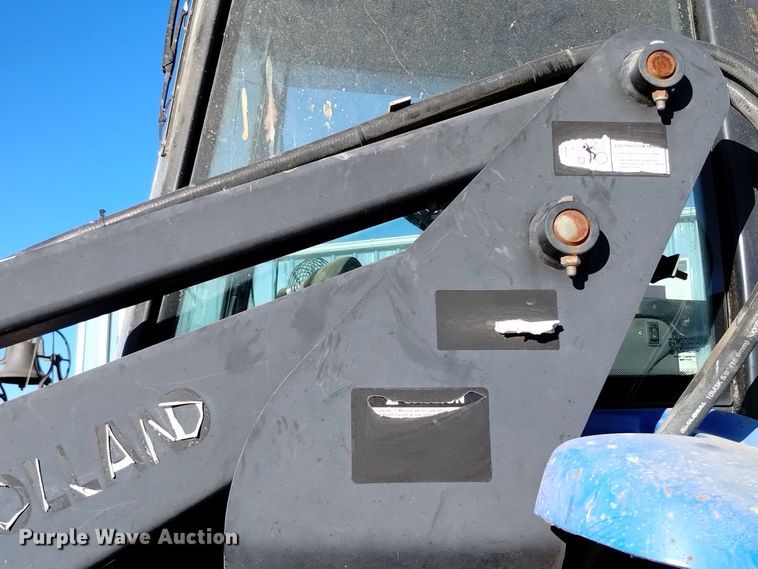 image for item EG9980 2002 New Holland  TV140 bi-directional tractor