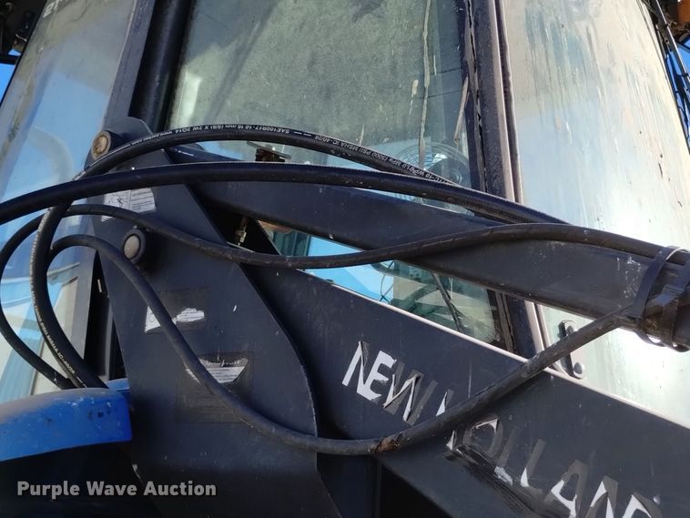 image for item EG9980 2002 New Holland  TV140 bi-directional tractor