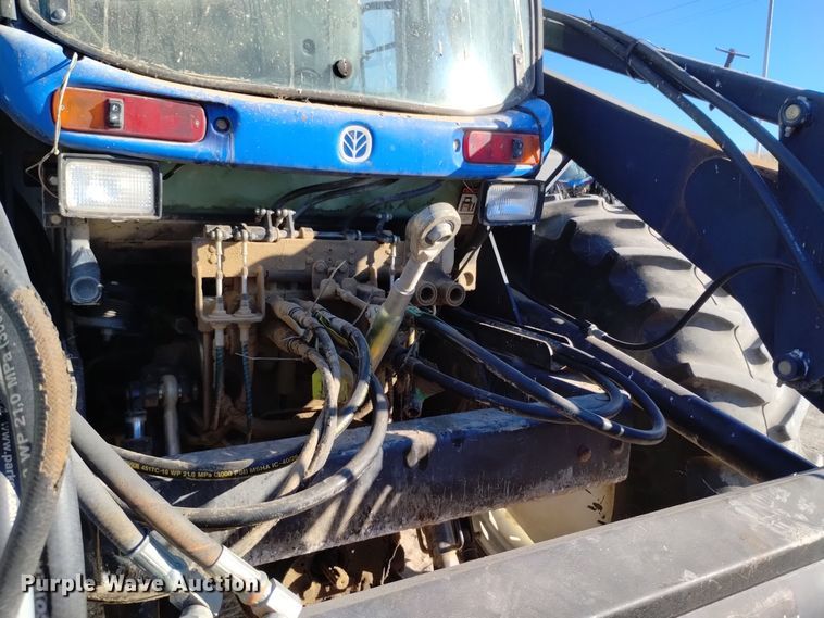 image for item EG9980 2002 New Holland  TV140 bi-directional tractor