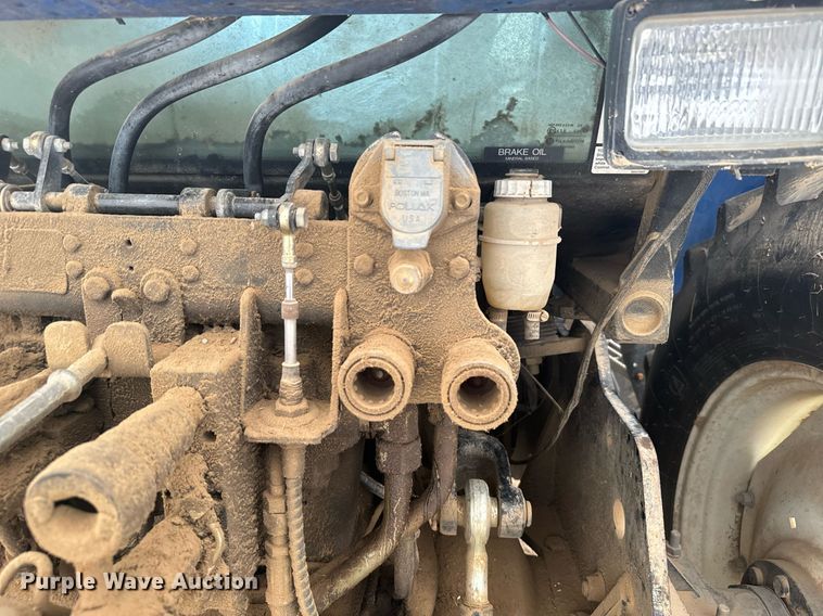 image for item EG9980 2002 New Holland  TV140 bi-directional tractor