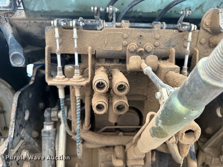 image for item EG9980 2002 New Holland  TV140 bi-directional tractor