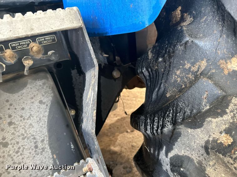 image for item EG9980 2002 New Holland  TV140 bi-directional tractor