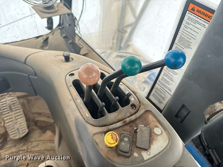 image for item EG9980 2002 New Holland  TV140 bi-directional tractor