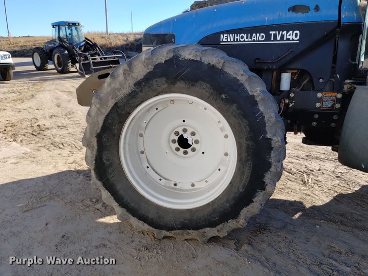 image for item EG9980 2002 New Holland  TV140 bi-directional tractor