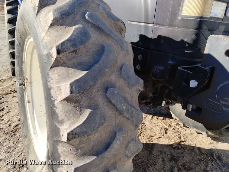 image for item EG9980 2002 New Holland  TV140 bi-directional tractor