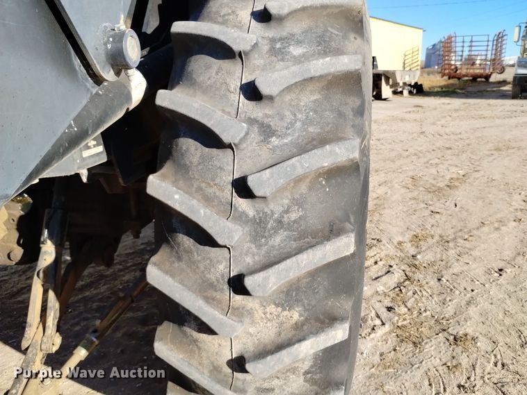 image for item EG9980 2002 New Holland  TV140 bi-directional tractor