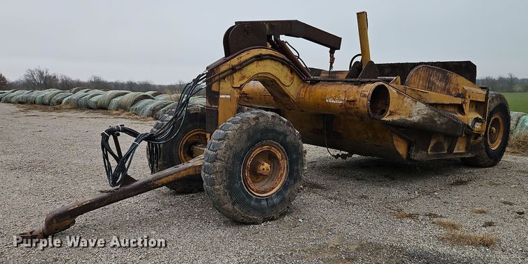 image for item EI8687 Caterpillar scraper