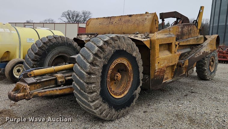 image for item EI8687 Caterpillar scraper