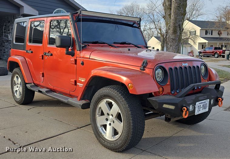 image for item DV0146 2009 Jeep Wrangler Unlimited Sahara SUV