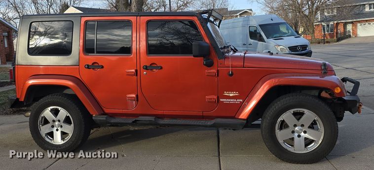 image for item DV0146 2009 Jeep Wrangler Unlimited Sahara SUV