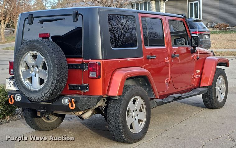 image for item DV0146 2009 Jeep Wrangler Unlimited Sahara SUV