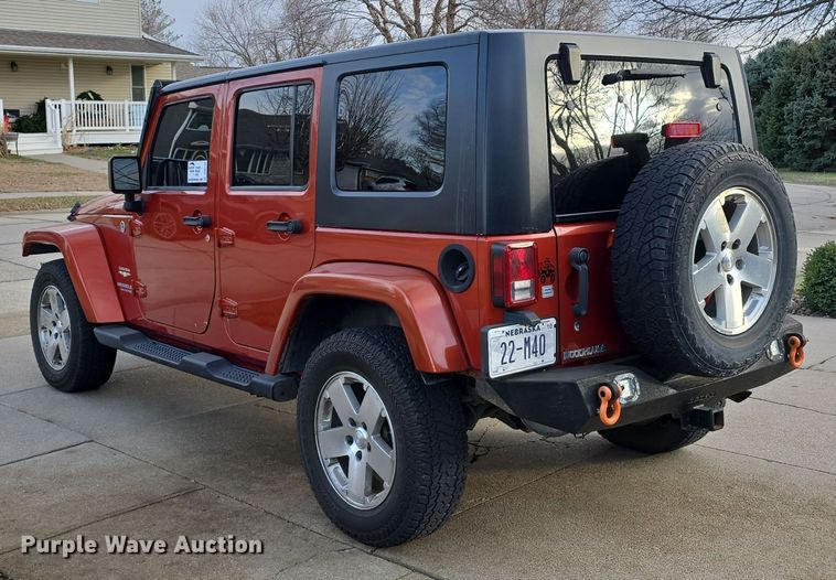 image for item DV0146 2009 Jeep Wrangler Unlimited Sahara SUV