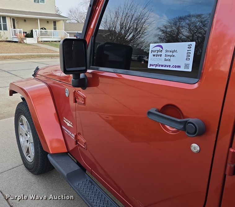 image for item DV0146 2009 Jeep Wrangler Unlimited Sahara SUV