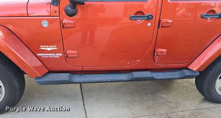 image for item DV0146 2009 Jeep Wrangler Unlimited Sahara SUV