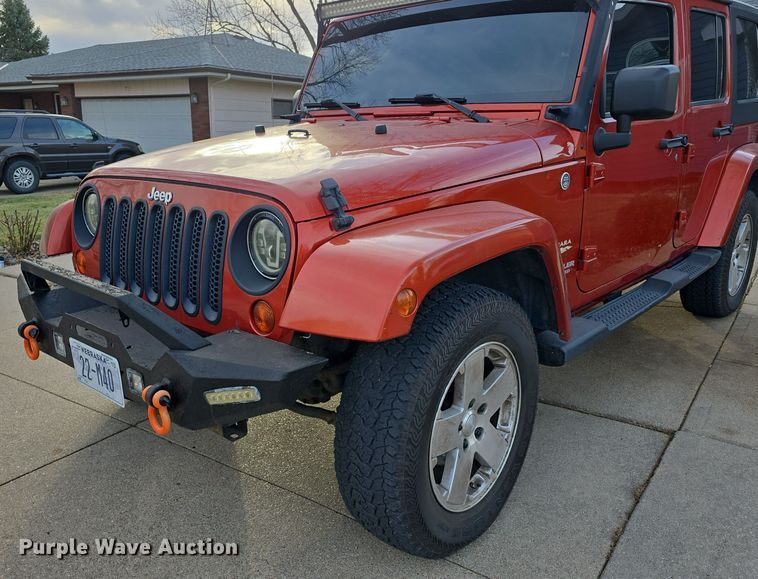 image for item DV0146 2009 Jeep Wrangler Unlimited Sahara SUV