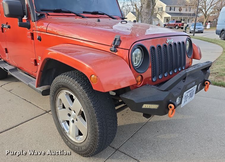 image for item DV0146 2009 Jeep Wrangler Unlimited Sahara SUV