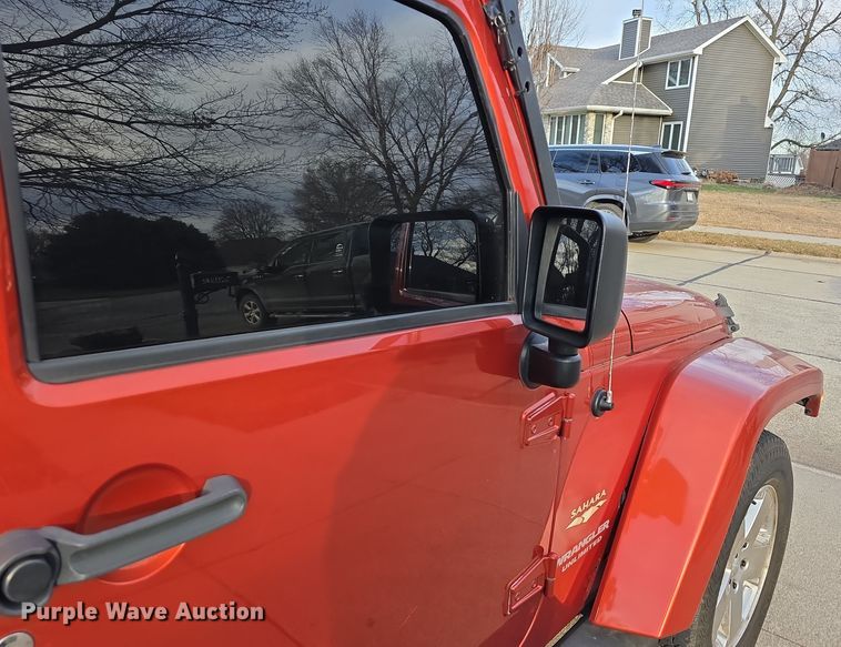 image for item DV0146 2009 Jeep Wrangler Unlimited Sahara SUV