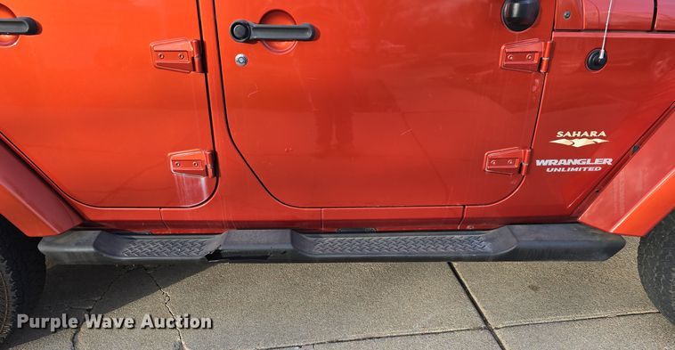 image for item DV0146 2009 Jeep Wrangler Unlimited Sahara SUV