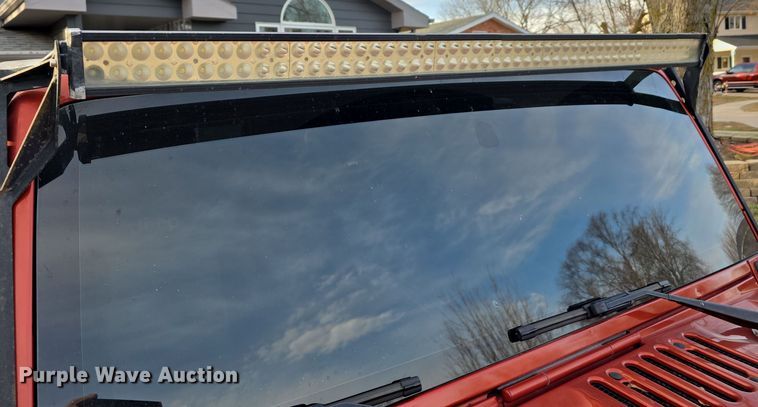 image for item DV0146 2009 Jeep Wrangler Unlimited Sahara SUV