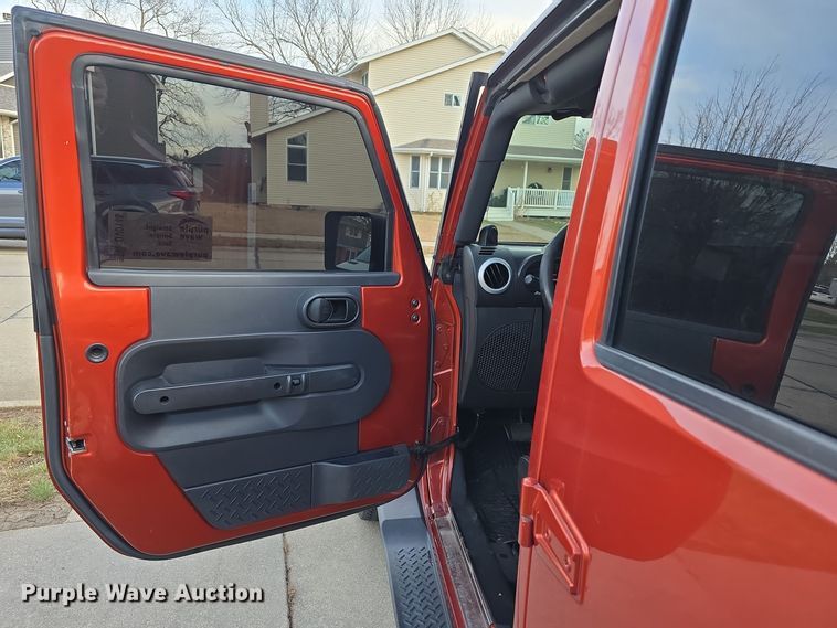 image for item DV0146 2009 Jeep Wrangler Unlimited Sahara SUV