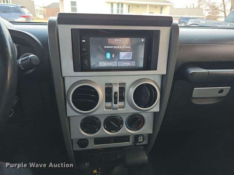 image for item DV0146 2009 Jeep Wrangler Unlimited Sahara SUV