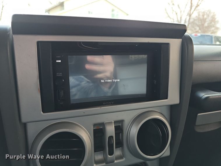 image for item DV0146 2009 Jeep Wrangler Unlimited Sahara SUV