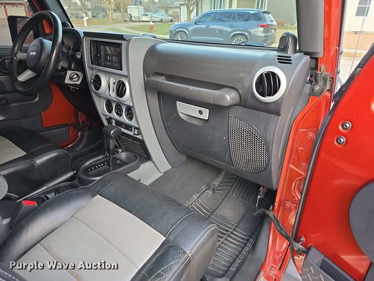 image for item DV0146 2009 Jeep Wrangler Unlimited Sahara SUV