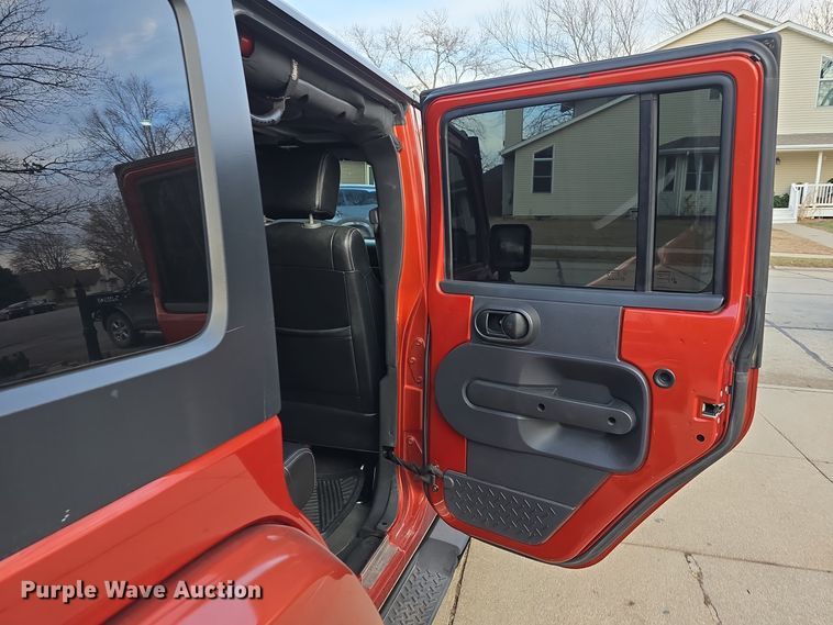 image for item DV0146 2009 Jeep Wrangler Unlimited Sahara SUV