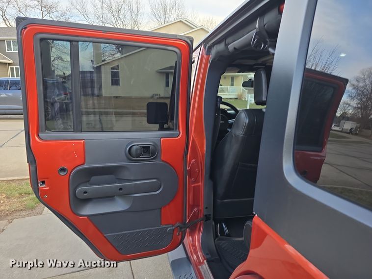 image for item DV0146 2009 Jeep Wrangler Unlimited Sahara SUV